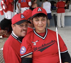 Wayne and Jamie Sibson of the Blackhawks sitting together during a rain delay.