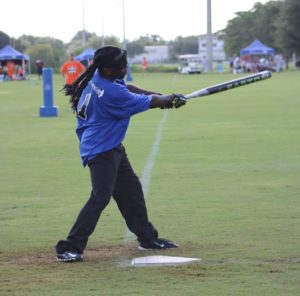 Jason Gainey with the Tyler Tigers hitting the ball.