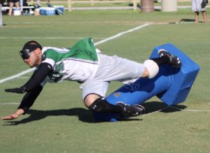 A San Antonio Jets player running so fast he completely wiped out a base.