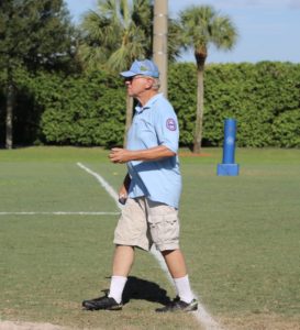 Umpire John Lykowski is focused on calling his game.