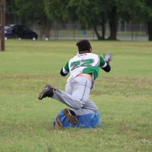 San Antonio Jet’s Axel Cox dives into a base.